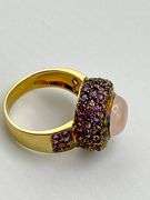 14KT Yellow Gold Cabochon Rose Quartz Center Stone Surrounded By Amethyst Halo Ring