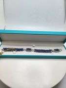 A true statement of elegance of Tanzanite and diamond Bracelet in Silver – GGA Certified. Set in lus