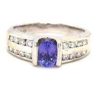 14kt White gold oval Tanzanite and 2 row channel set diamond ring