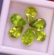 Collectors 5.67ct vivid lime green Sphene set