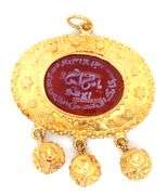 18kt Yellow gold Carnelian carved pendant