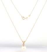 14kt Yellow gold 7mm pearl and diamond pendant on chain