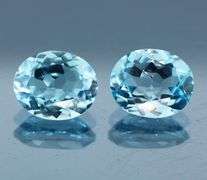 Huge! 12x10mm pair of swiss blue Topaz weighing 9.10 carats!