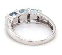 14kt White gold blue topaz and diamond ring