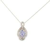 6.57ct Oval Tanzanite and 0.85ctw Diamond Swirl Framed Pendant Necklace in 14K