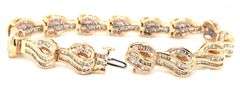 14kt Yellow gold 4.50ctw baguette diamond wave bracelet