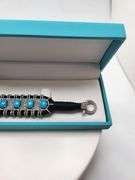 Turquoise Bracelet in Handwoven Fabric