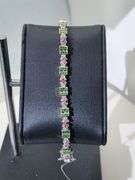 Old Fashion Silver Bracelet with high value Diamonds, Emeralds, and Rubies