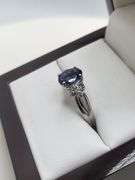 Very fine Tanzanite ring in silver , GGA certified with diamond