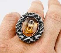 925 Sterling Silver Large Oval Amber Color Stone With Halo And Intricate Black and White Crystal Pav