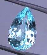 Absolutely stunning 15.05ct pear cut vibrant Swiss blue Topaz
