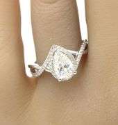 14kt White gold 1.07ct lab grown diamond pear shaped in Gabriel & Co 0.26ctw halo open Infinity diam