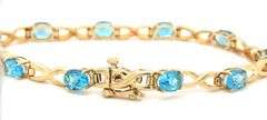 14kt Yellow gold oval blue topaz bracelet
