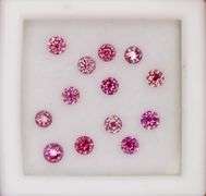 Collectors large sized 13 piece .73ct set of real Pink Diamonds!