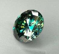 Dazzling 6.5 Deep Emerald Green Moissanite Solitaire