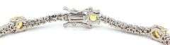 Round brilliant yellow and white cubic zirconia tennis bracelet in 925 sterling silver