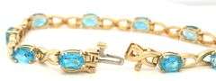 14kt Yellow gold oval blue topaz bracelet