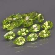 Dazzling 8.60ct untreated apple green Peridot set