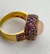 14KT Yellow Gold Cabochon Rose Quartz Center Stone Surrounded By Amethyst Halo Ring