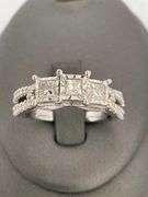 CERTIFIED LADIES 10K WHITE GOLD AND DIAMOND RING.