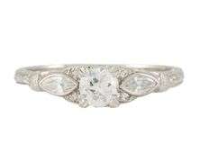 Vintage 0.55ctw European and Marquise Diamond Filigree Scroll Ring in Platinum
