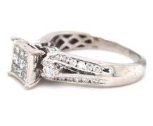 10kt White gold 0.80ctw princess cut and round brilliant cut diamond cluster ring