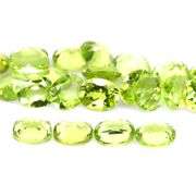 Dazzling 9.20ct untreated apple green Peridot set