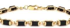 14kt Yellow gold emerald cut black onyx station bracelet