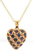 18kt Yellow gold reversible sapphire and ruby heart shaped pendant on chain