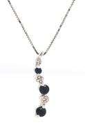 10kt White gold blue sapphire and diamond pendant on chain