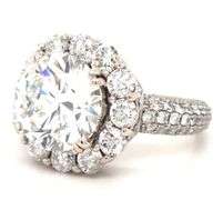 18kt White gold 5.05ct lab grown round brilliant cut with 2.65ctw halo with pave diamond setting