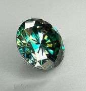 Dazzling 6.5 Deep Emerald Green Moissanite Solitaire