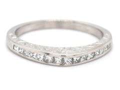Platinum 0.75ctw channel set princess cut diamond dome ring