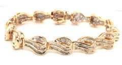 14kt Yellow gold 4.50ctw baguette diamond wave bracelet