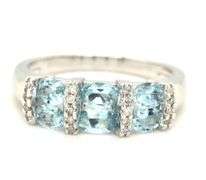 14kt White gold blue topaz and diamond ring