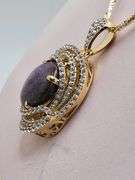 Extremely fine quality one Cabochon Ruby and Sapphire pendent in silver, GGA certfied