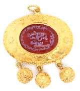 18kt Yellow gold Carnelian carved pendant