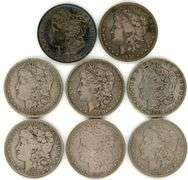Collectible run of 8 different Morgan Silver Dollars 1879 to 1890-O