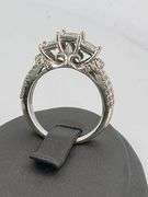 CERTIFIED LADIES 10K WHITE GOLD AND DIAMOND RING.