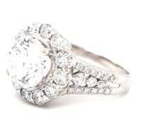 18kt White gold 3.04ct round brilliant cut lab grown diamond in natural diamond halo setting