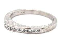 Platinum 0.75ctw channel set princess cut diamond dome ring