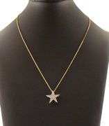 1.15ctw Diamond Star Two Tone Pendant Necklace in 18K