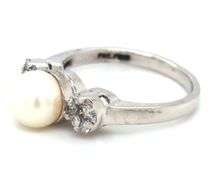 14kt White gold 6.5mm pearl and diamond cluster ring