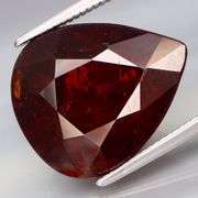 Huge! Chianti red! 12.85ct top luster Spessartite Garnet