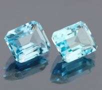 Dazzling 5.25ct vivid blue emerald cut Topaz pair