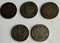 Five Different English Shillings.