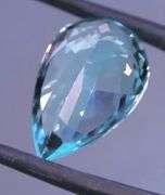 Absolutely stunning 15.05ct pear cut vibrant Swiss blue Topaz