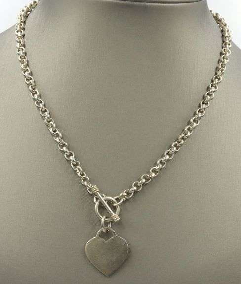 Vintage 925 Sterling silver necklace with heart shaped charm