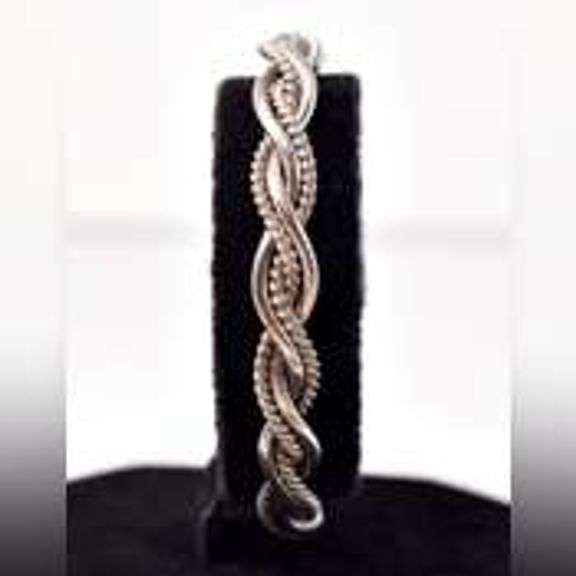 Braided Twist Cuff Bracelet in Sterling Silver.