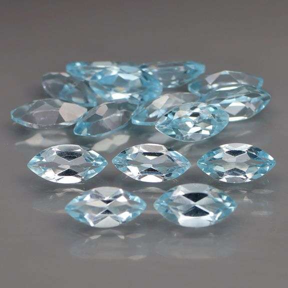 Brilliant! 9.10ct marquise cut Swiss blue Topaz set!